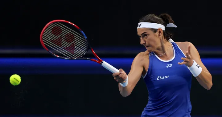 epa10382530 Caroline Garcia of France in action against Nadia Podoroska of Argentina during the 2023 United Cup tennis match between France and Argentina at RAC Arena in Perth, Australia, 30 December 2022. EPA/RICHARD WAINWRIGHT AUSTRALIA AND NEW ZEALAND OUT