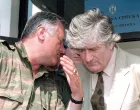 epa08529962 (FILE) - Republika Srpska leader Radovan Karadzic (R) listens to VRS Commander Ratko Mladic (L) during a meeting in Pale, Bosnia and Herzegovina, 05 August 1993 (reissued 06 July 2020). A quarter of a century ago, the world witnessed the worst mass murder on European soil since World War II. Some 7,000-8,000 Bosniaks were slaughtered and 20,000 civilians were forcibly displaced in an act of ethnic cleansing perpetrated in the small eastern Bosnian village of Srebrenica, whose name will forever be linked to the infamous 1995 massacre. Today, 25 years after the massacre, the memory of its victims is kept alive by several institutions, such as the Museum of Crimes Against Humanity and Genocide in Sarajevo or a permanent exhibit at the 'Memorial Center Srebrenica-Potocari' that now occupies the former headquarters of the Dutch UNPROFOR Battalion. EPA/STRINGER ATTENTION: This Image is part of a PHOTO SET *** Local Caption *** 02761942/Stringer