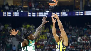 Basketball - EuroLeague Final Four - Semi Final - Fenerbahce v Panathinaikos - Etihad Arena, Abu Dhabi, United Arab Emirates - May 23, 2025 Fenerbahce's Devon Hall in action with Panathinaikos' Kendrick Nunn REUTERS/Rula Rouhana