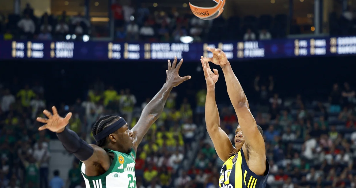 Basketball - EuroLeague Final Four - Semi Final - Fenerbahce v Panathinaikos - Etihad Arena, Abu Dhabi, United Arab Emirates - May 23, 2025 Fenerbahce's Devon Hall in action with Panathinaikos' Kendrick Nunn REUTERS/Rula Rouhana