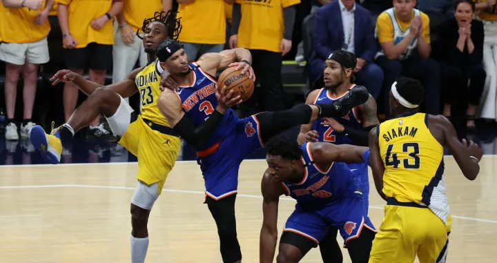 May 25, 2025; Indianapolis, Indiana, USA; New York Knicks guard Josh Hart (3) and Indiana Pacers forward Aaron Nesmith (23) battle for control of the ball during the fourth quarter of game three of the eastern conference finals for the 2025 NBA Playoffs at Gainbridge Fieldhouse. Mandatory Credit: Trevor Ruszkowski-Imagn Images