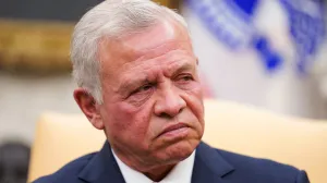 FILE PHOTO: Jordan's King Abdullah looks on, during a meeting with U.S. President Donald Trump in the Oval Office at the White House in Washington, U.S., February 11, 2025. REUTERS/Nathan Howard/File Photo/Nathan Howard