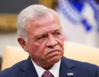 FILE PHOTO: Jordan's King Abdullah looks on, during a meeting with U.S. President Donald Trump in the Oval Office at the White House in Washington, U.S., February 11, 2025. REUTERS/Nathan Howard/File Photo/Nathan Howard
