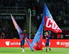 Soccer Football - LaLiga - FC Barcelona v Villarreal - Estadi Olimpic Lluis Companys, Barcelona, Spain - May 18, 2025 FC Barcelona's Marc Casado and FC Barcelona's Lamine Yamal celebrate with flags after winning LaLiga REUTERS/Albert Gea