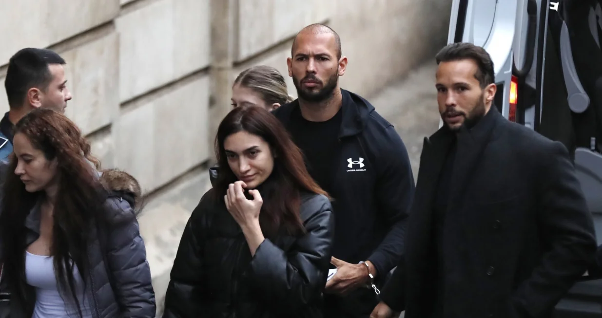 epa10397729 Former professional kickboxer and social media influencer, American-British businessman Andrew Tate (C), his brother Tristan (R), and unidentified women are escorted by Romanian police officers inside the Court of Appeal building for a hearing in their trial in Bucharest, Romania, 10 January 2023. On 29 December 2022, Andrew and Tristan Tate were arrested as a result of Directorate for Investigating Organized Crime and Terrorism (DIICOT) division inquiry under the charges of human trafficking and the intention of forming an organized crime group. Romanian police stated that the two brothers and their associates coerced victims for creating a paid pornography service for social media platforms. A Romanian judge ordered on 30 December 2022 that Andrew Tate shall remain in police custody for 30 days, as criminal police investigation is ongoing. In total, 11 cars and ten buildings located near Bucharest, or in Ilfov and Prahova counties, owned by the Tate brothers, were seized by the Romanian authorities until the inquiry will be finished. EPA/Robert Ghement/Robert Ghement