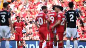 Soccer Football - Premier League - Liverpool v Arsenal - Anfield, Liverpool, Britain - May 11, 2025 Liverpool's Trent Alexander-Arnold before a free kick REUTERS/Phil Noble EDITORIAL USE ONLY. NO USE WITH UNAUTHORIZED AUDIO, VIDEO, DATA, FIXTURE LISTS, CLUB/LEAGUE LOGOS OR 'LIVE' SERVICES. ONLINE IN-MATCH USE LIMITED TO 120 IMAGES, NO VIDEO EMULATION. NO USE IN BETTING, GAMES OR SINGLE CLUB/LEAGUE/PLAYER PUBLICATIONS. PLEASE CONTACT YOUR ACCOUNT REPRESENTATIVE FOR FURTHER DETAILS..
