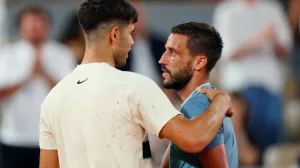 Carlos Alcaraz i Damir Džumhur (FOTO: REUTERS/Denis Balibouse)
