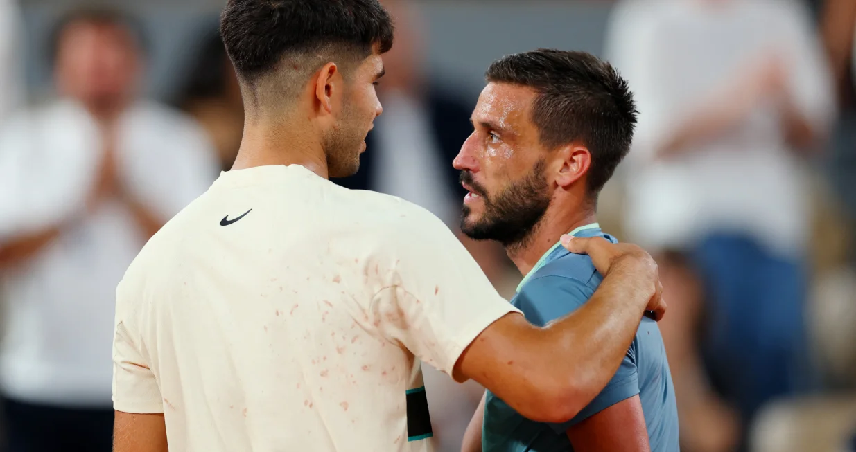 Carlos Alcaraz i Damir Džumhur (FOTO: REUTERS/Denis Balibouse)