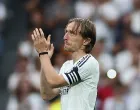 Soccer Football - LaLiga - Real Madrid v Real Sociedad - Santiago Bernabeu, Madrid, Spain - May 24, 2025 Real Madrid's Luka Modric acknowledges fans on the pitch after playing his last LaLiga match for Real Madrid REUTERS/Isabel Infantes