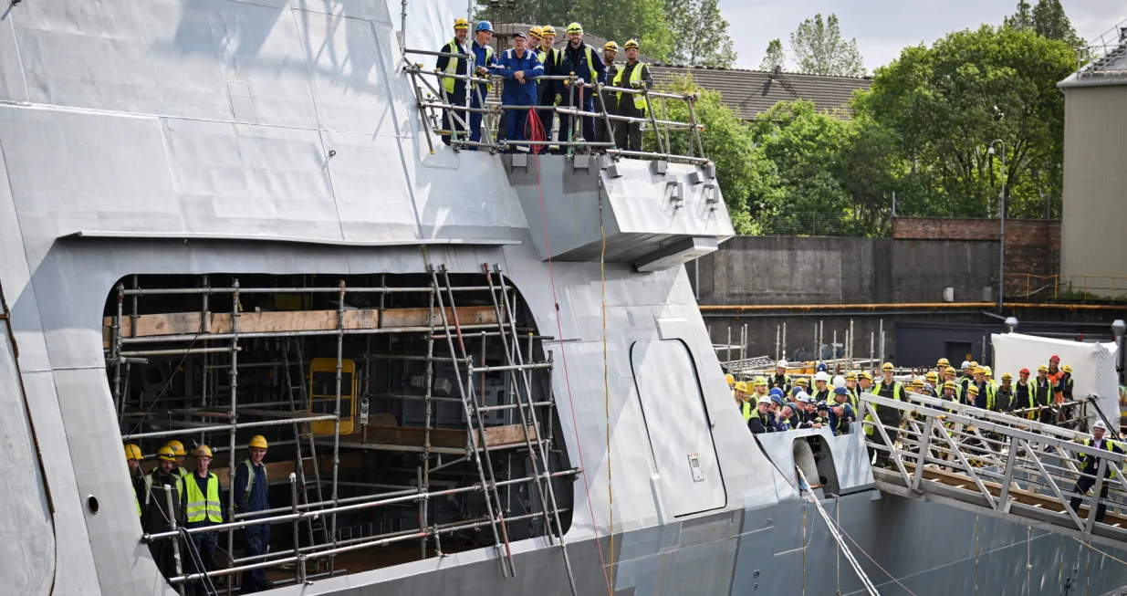Members of staff react during a visit by Britain's Prime Minister Keir Starmer to the BAE Systems' Govan facility, in Glasgow, Scotland, Britain, June 2, 2025. Andy Buchanan/Pool via REUTERS/Andy Buchanan