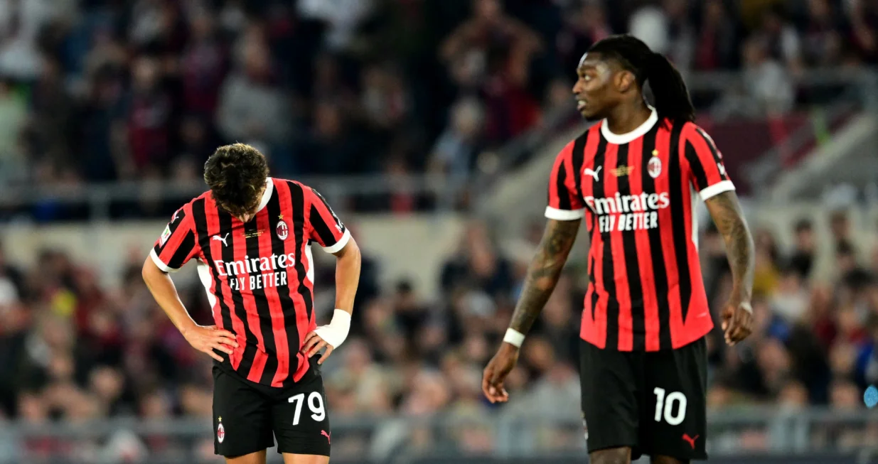 Soccer Football - Coppa Italia - Final - AC Milan v Bologna - Stadio Olimpico, Rome, Italy - May 14, 2025 AC Milan's Joao Felix and Rafael Leao look dejected REUTERS/Daniele Mascolo