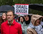 A person holds a sign during a demonstration in solidarity with Palestinians calling for a halt in arms trade and relations with Israel, in Madrid, Spain, May 10, 2025. REUTERS/Violeta Santos Moura/Violeta Santos Moura