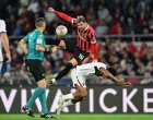 Soccer Football - Coppa Italia - Final - AC Milan v Bologna - Stadio Olimpico, Rome, Italy - May 14, 2025 AC Milan's Theo Hernandez in action with Bologna's Dan Ndoye REUTERS/Daniele Mascolo