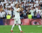 Soccer Football - LaLiga - Real Madrid v Real Sociedad - Santiago Bernabeu, Madrid, Spain - May 24, 2025 Real Madrid's Luka Modric acknowledges fans on the pitch after playing his last LaLiga match for Real Madrid REUTERS/Isabel Infantes