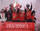 Soccer Football - Premier League - Liverpool Victory Parade - Liverpool, Britain - May 26, 2025 Liverpool's Mohamed Salah celebrates with the trophy and Dominik Szoboszlai, Luis Diaz and Darwin Nunez after winning the Premier League on the bus during the Victory parade REUTERS/Phil Noble  TPX IMAGES OF THE DAY