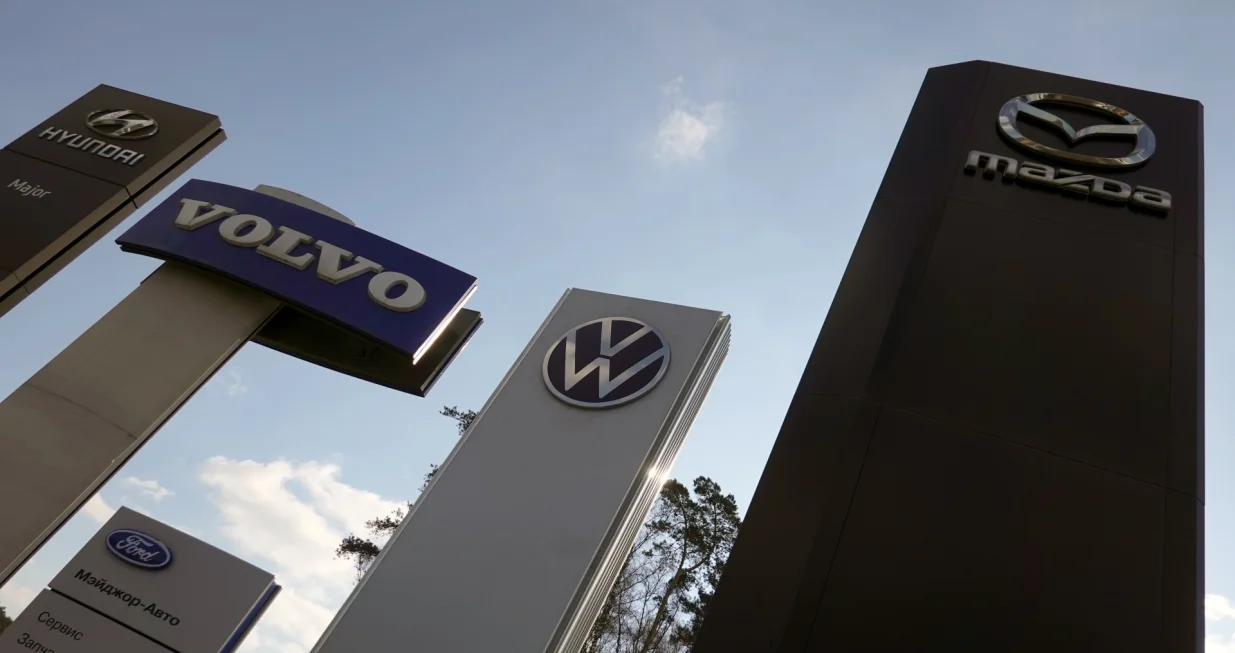 epa09828796 A view of the logos of Hyundai, Volvo, Volkswagen, Ford and Mazda at a car show room in Moscow Russia, 16 March 2022. On 24 February Russian troops had entered Ukrainian territory in what the Russian president declared a 'special military operation', resulting in fighting and destruction in the country, a huge flow of refugees, and multiple sanctions against Russia. As the result of sanctions imposed by the West on Russia, a number of automakers, including Volvo, BMW, Jaguar, Land Rover, Mercedes-Benz, Toyota, Mazda and others, have announced the suspension or limitation of their business in Russia, which had a significant impact on the Russian car market. EPA/MAXIM SHIPENKOV/Maxim Shipenkov