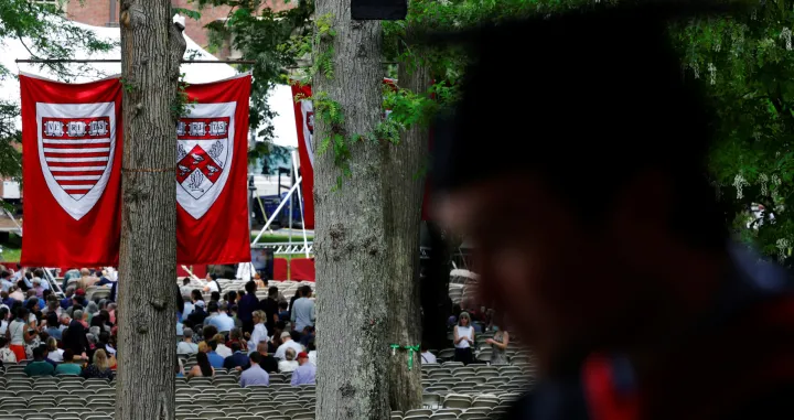 Graduating students and their families gather for Class Day Exercises, part of Harvard University's 374th Commencement, in Cambridge, Massachusetts, U.S., May 28, 2025. REUTERS/Brian Snyder/Brian Snyder