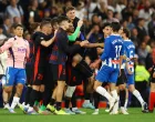 Soccer Football - LaLiga - Espanyol v FC Barcelona - RCDE Stadium, Cornella de Llobregat, Spain - May 15, 2025 FC Barcelona's Ronald Araujo and FC Barcelona's Gavi clash with Espanyol's Pere Milla REUTERS/Albert Gea