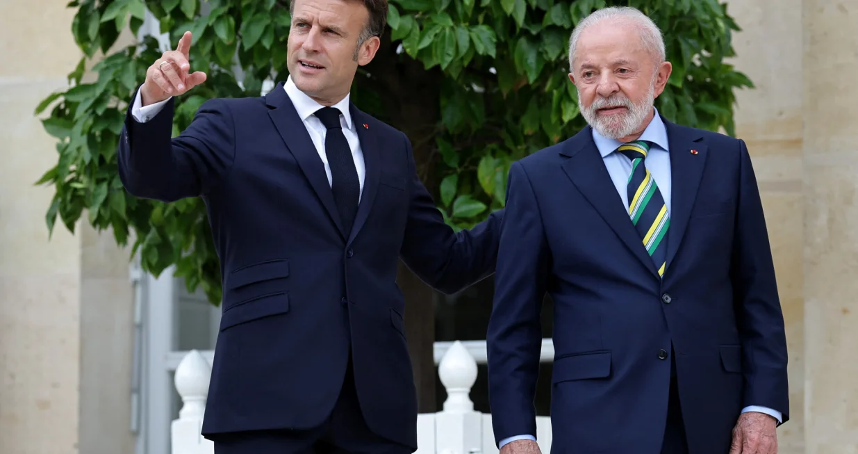 French President Emmanuel Macron and Brazilian President Luiz Inacio Lula da Silva walk after a press conference at the Elysee Palace in Paris, France, 05 June 2025. CHRISTOPHE PETIT TESSON/Pool via REUTERS/Christophe Petit Tesson