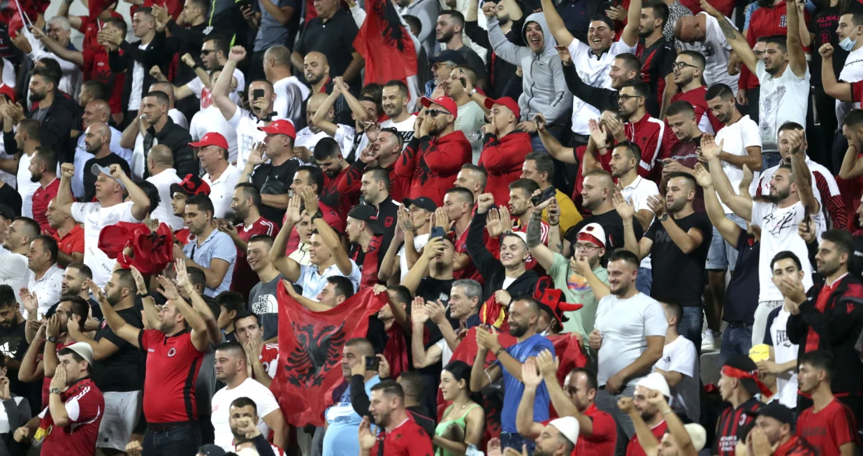 epa09449970 Fans of Albania celebrate after the FIFA World Cup 2022 qualifying soccer match between Albania and Hungary in Elbasan, Albania, 05 September 2021. EPA/MALTON DIBRA