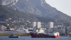 epa10299296 The Ocean Viking rescue ship (R), operated by French maritime-humanitarian organization SOS Mediterranee, enters the harbor escorted by a military boat (L), in Toulon, France, 11 November 2022. SOS Mediterranee on 10 November announced receiving the green light by French authorities to allow the over 230 migrants onboard to disembark in Toulon. The vessel spent weeks at sea after rescuing migrants during several operations throughout October. EPA/GUILLAUME HORCAJUELO/Guillaume Horcajuelo