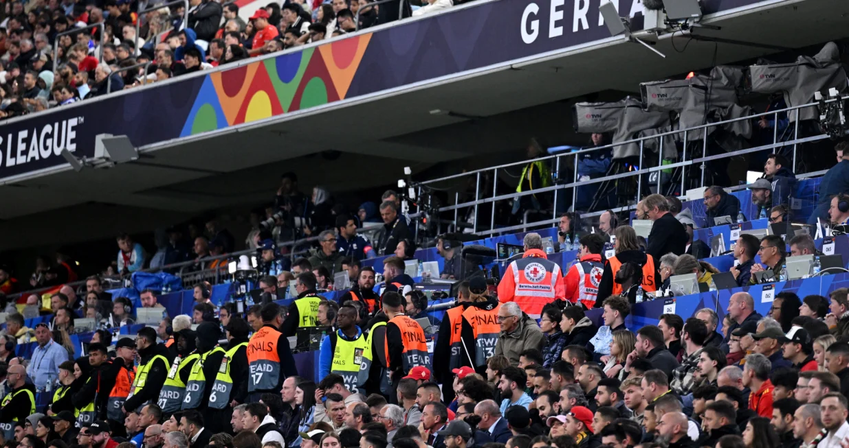 Soccer Football - Nations League - Final - Portugal v Spain - Allianz Arena, Munich, Germany - June 8, 2025 Paramedics and stewards in the stands after an incident during the match REUTERS/Angelika Warmuth