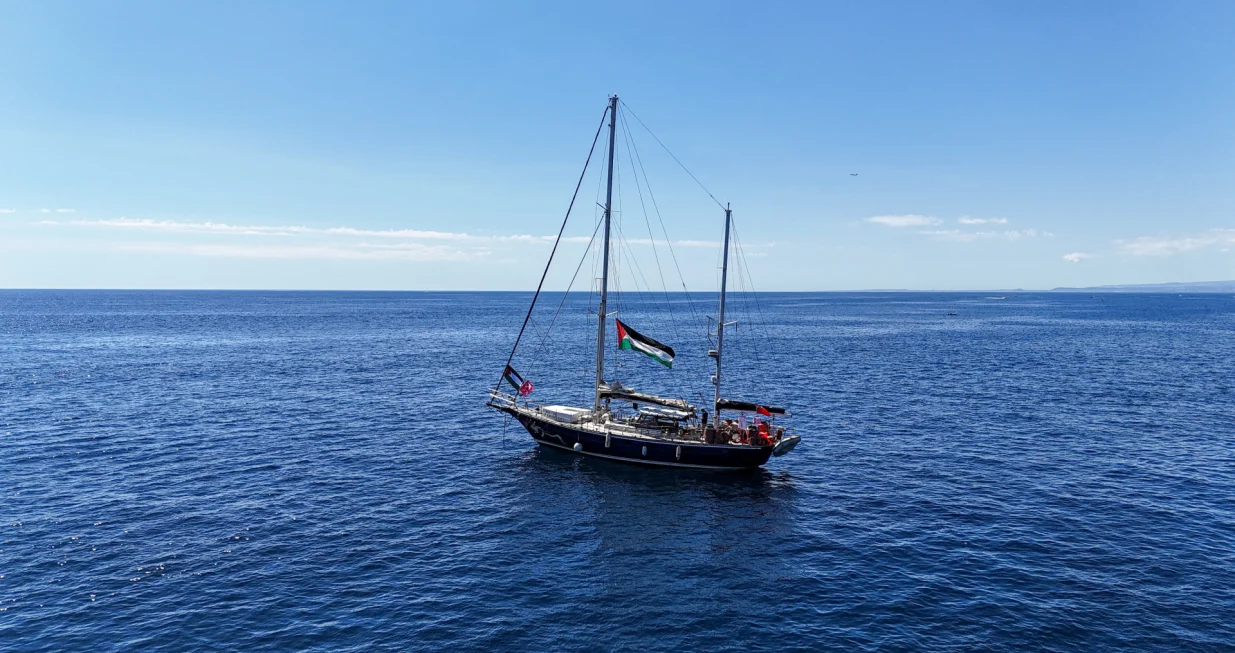 A drone view shows the Gaza-bound aid ship Madleen, organized by the international NGO Freedom Flotilla Coalition, anchored off the coast of Catania, Italy, on June 1, 2025. REUTERS/Danilo Arnone/Danilo Arnone