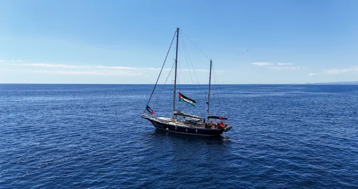 A drone view shows the Gaza-bound aid ship Madleen, organized by the international NGO Freedom Flotilla Coalition, anchored off the coast of Catania, Italy, on June 1, 2025. REUTERS/Danilo Arnone/Danilo Arnone
