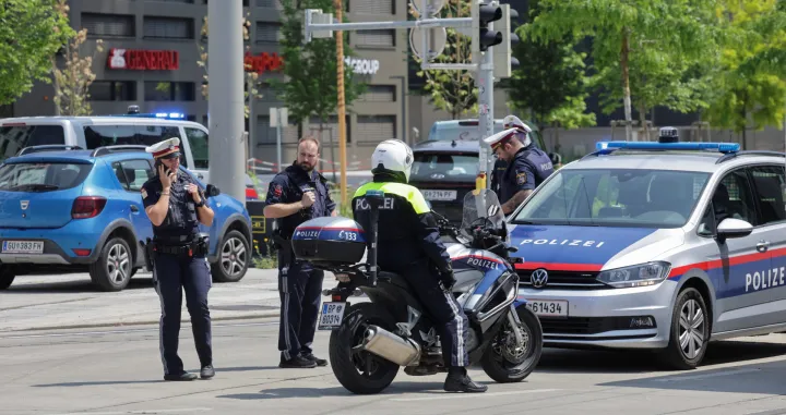 Police officers stand guard near a school following a deadly school shooting in Graz, Austria, June 10, 2025. REUTERS/Leonhard Foeger/Leonhard Foeger