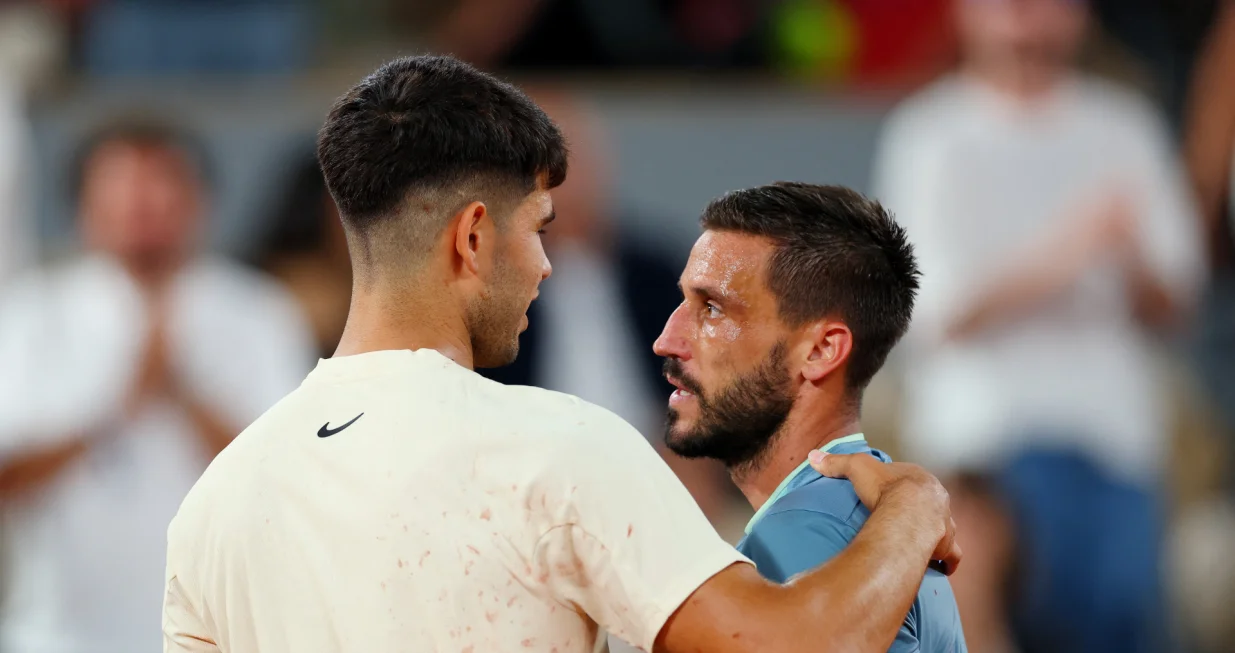 Carlos Alcaraz i Damir Džumhur (FOTO: REUTERS/Denis Balibouse)