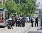 Police officers stand guard near a school following a deadly school shooting in Graz, Austria, June 10, 2025. REUTERS/Leonhard Foeger/Leonhard Foeger