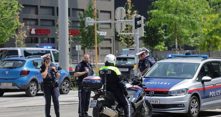 Police officers stand guard near a school following a deadly school shooting in Graz, Austria, June 10, 2025. REUTERS/Leonhard Foeger/Leonhard Foeger