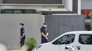 Police officers stand guard near a school following a deadly school shooting in Graz, Austria, June 10, 2025. REUTERS/Leonhard Foeger/Leonhard Foeger