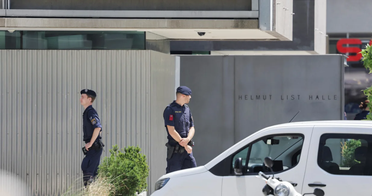 Police officers stand guard near a school following a deadly school shooting in Graz, Austria, June 10, 2025. REUTERS/Leonhard Foeger/Leonhard Foeger