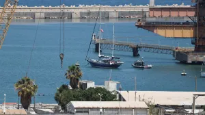 Gaza-bound British-flagged yacht "Madleen" is docked next to a military boat Ashdod port following a takeover by the Israeli army, in Ashdod, Israel, June 10, 2025. REUTERS/Nir Elias/Nir Elias