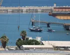 Gaza-bound British-flagged yacht "Madleen" is docked next to a military boat Ashdod port following a takeover by the Israeli army, in Ashdod, Israel, June 10, 2025. REUTERS/Nir Elias/Nir Elias