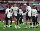 Soccer Football - Champions League - Real Madrid Training - Emirates Stadium, London, Britain - April 7, 2025 Real Madrid's Rodrygo, Real Madrid's Jesus Vallejo, Real Madrid's Antonio Rudiger and Real Madrid's Jude Bellingham during training Action Images via Reuters/Matthew Childs