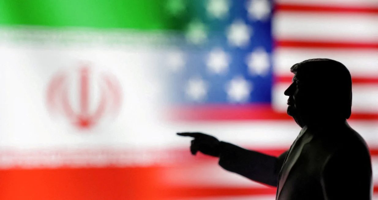 FILE PHOTO: A 3D-printed miniature model depicting U.S. President Donald Trump, Iranian and U.S. flags in this illustration taken, April 17, 2025. REUTERS/Dado Ruvic/Illustration/File Photo/Dado Ruvic