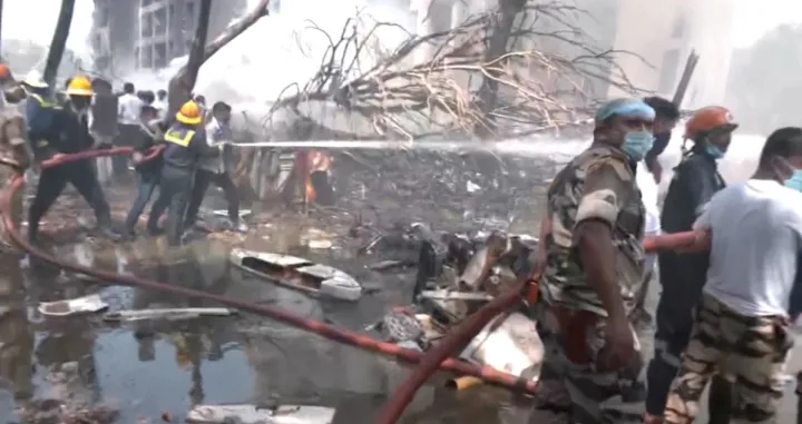 Emergency personnel work at the crash site of an Air India plane in Ahmedabad, India, June 12, 2025, in this still image taken from video. ANI/Reuters TV via REUTERS THIS IMAGE HAS BEEN SUPPLIED BY A THIRD PARTY. INDIA OUT. NO COMMERCIAL OR EDITORIAL SALES IN INDIA.  TPX IMAGES OF THE DAY/Ani