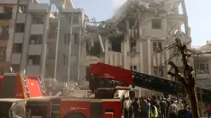 Rescuers work at the scene of a damaged building in the aftermath of Israeli strikes, in Tehran, Iran, June 13, 2025. Majid Asgaripour/WANA (West Asia News Agency) via REUTERS ATTENTION EDITORS - THIS PICTURE WAS PROVIDED BY A THIRD PARTY/Majid Asgaripour