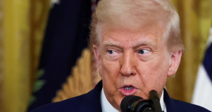FILE PHOTO: U.S. President Donald Trump speaks before signing a resolution approved by Congress to rescind the EPA's 2023 approval of California's plans to require a rising number of zero-emission heavy-duty trucks, and another resolution on California's low-NOx, or low-nitrogen oxide, regulation for heavy-duty highway and off-road vehicles and engines, at the White House in Washington, D.C., U.S., June 12, 2025. REUTERS/Evelyn Hockstein/File Photo/Evelyn Hockstein