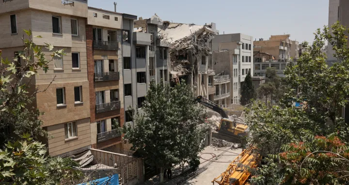 A building stands damaged in the aftermath of Israeli strikes, in Tehran, Iran, June 14, 2025. Majid Asgaripour/WANA (West Asia News Agency) via REUTERS ATTENTION EDITORS - THIS PICTURE WAS PROVIDED BY A THIRD PARTY.  TPX IMAGES OF THE DAY/Majid Asgaripour