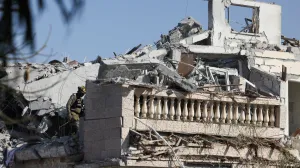 A rescue personnel works at an impact site following missile attack from Iran on Israel, in Rishon LeZion, Israel, June 14, 2025. REUTERS/Ronen Zvulun/Ronen Zvulun