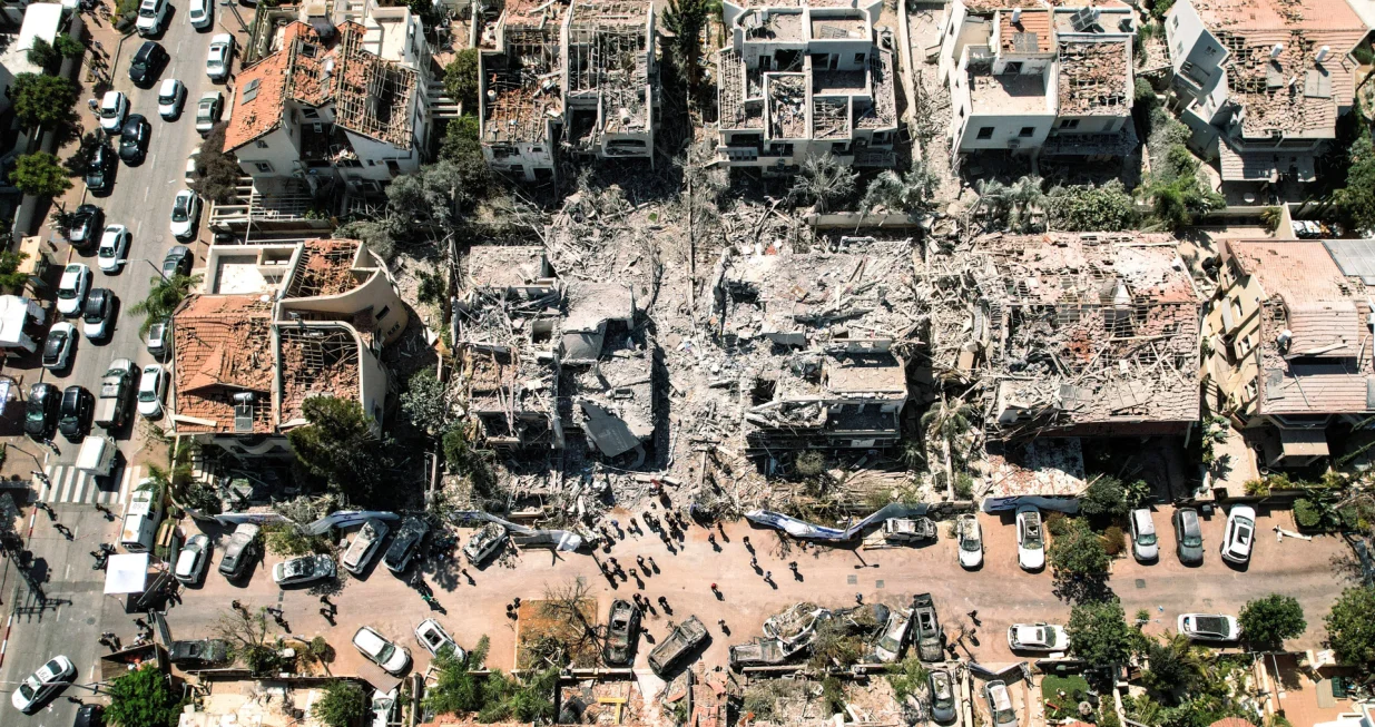 A drone photo shows the damage over residential homes and at the impact site following missile attack from Iran on Israel, in Rishon LeZion, Israel, June 14, 2025. REUTERS/Ammar Awad/Ammar Awad