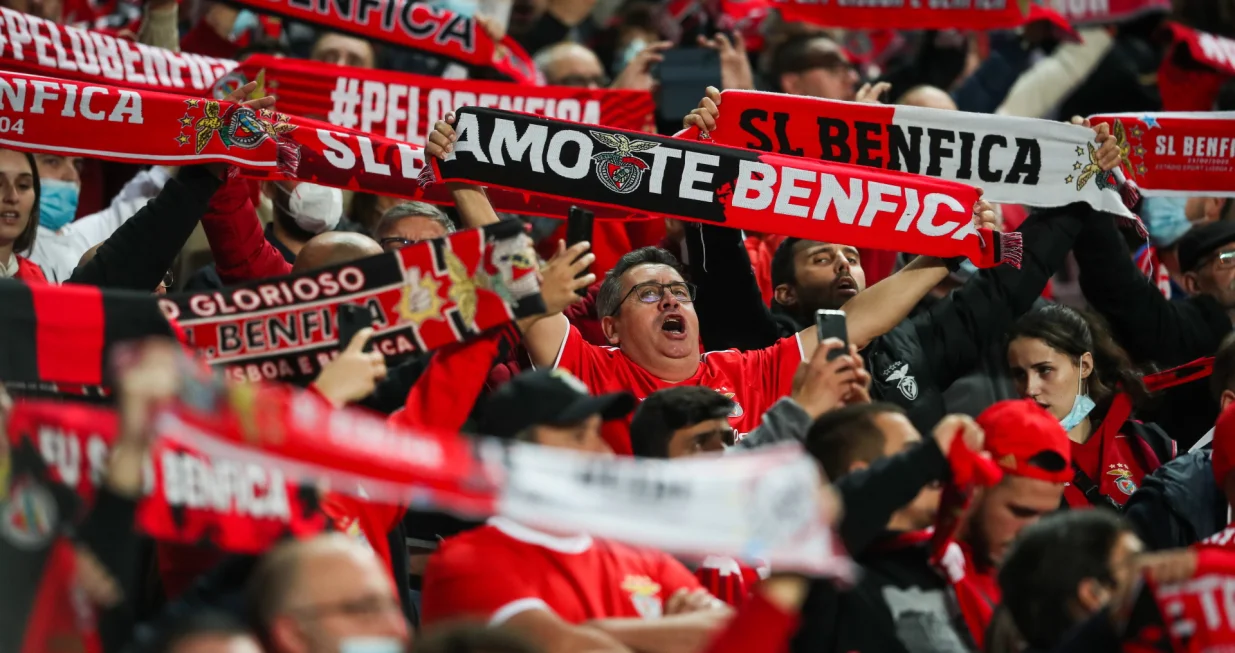 epa09779619 Benfica´s fans cheer during the UEFA Champions League round of 16 first leg soccer match against Ajax Amsterdam at Luz Stadium, in Lisbon, Portugal, 23 February 2022. EPA/JOSE SENA GOULAO