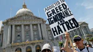 Protesters march through the streets during one of several nationwide "No Kings" protests against U.S. President Donald Trump in San Francisco, California, U.S. June 14, 2025. REUTERS/Daniel Dreifuss/Daniel Dreifuss