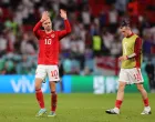 epa10337513 Welsh players Aaron Ramsey (L) and Gareth Bale (R) react after the FIFA World Cup 2022 group B soccer match between Wales and England at Ahmad bin Ali Stadium in Doha, Qatar, 29 November 2022. EPA/Friedemann Vogel