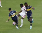 Soccer Football - FIFA Club World Cup - Group C - Boca Juniors v Benfica - Hard Rock Stadium, Miami Gardens, Florida, U.S. - June 16, 2025 Boca Juniors' Alan Velasco and Boca Juniors' Luis Advincula in action with Benfica's Bruma REUTERS/Marco Bello