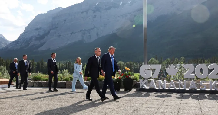European Council President Antonio Costa, Japan's Prime Minister Shigeru Ishiba, Italian Prime Minister Giorgia Meloni, French President Emmanuel Macron, Canada Prime Minister Mark Carney and U.S. President Donald Trump leave after a family photo session during the G7 Summit, in Kananaskis, Alberta, Canada, June 16, 2025. REUTERS/Suzanne Plunkett/Pool REFILE - CORRECTING INFORMATION FROM "ARRIVE FOR A FAMILY PHOTO" TO "LEAVE AFTER A FAMILY PHOTO SESSION"./Suzanne Plunkett