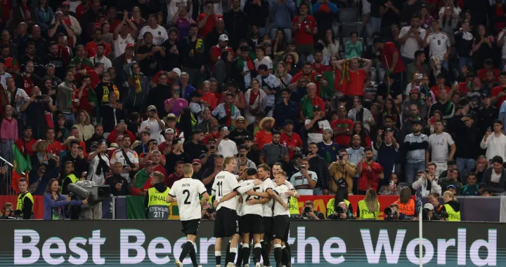 Soccer Football - Nations League - Semi Final - Germany v Portugal - Allianz Arena, Munich, Germany - June 4, 2025 Germany's Florian Wirtz celebrates scoring their first goal with teammates REUTERS/Michaela Stache